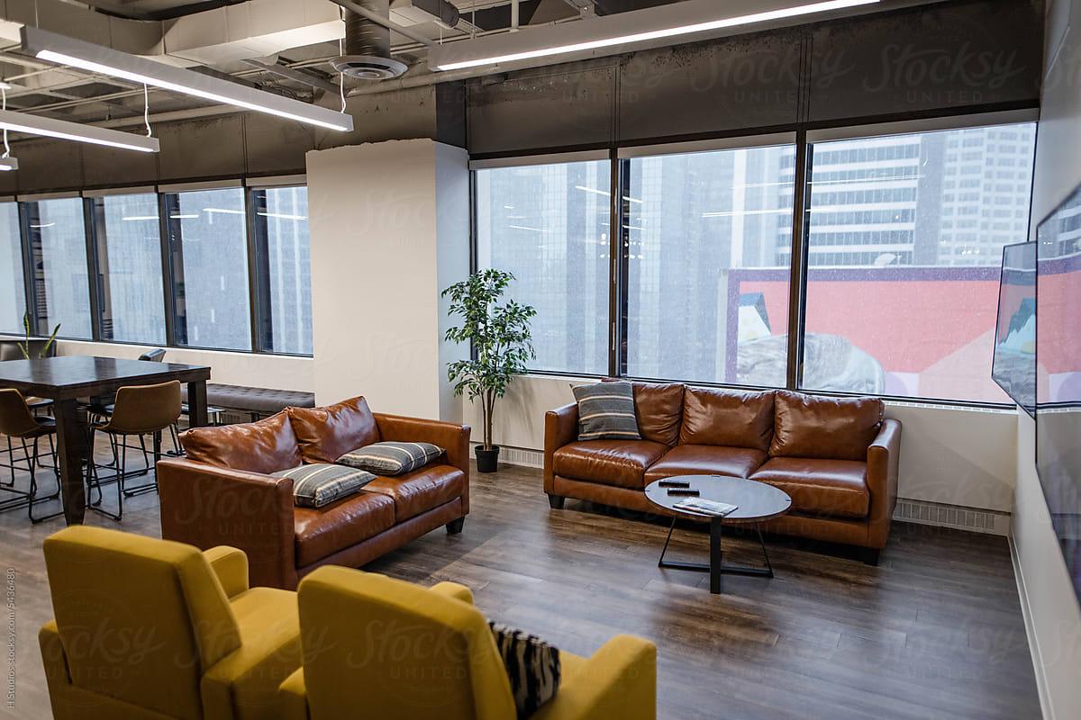 Leather sofas and armchairs in modern highrise office