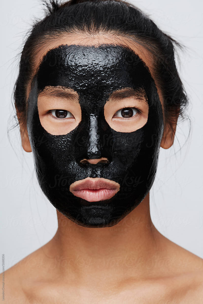 Skincare - Asian Woman Portrait Using Charcoal Face Mask