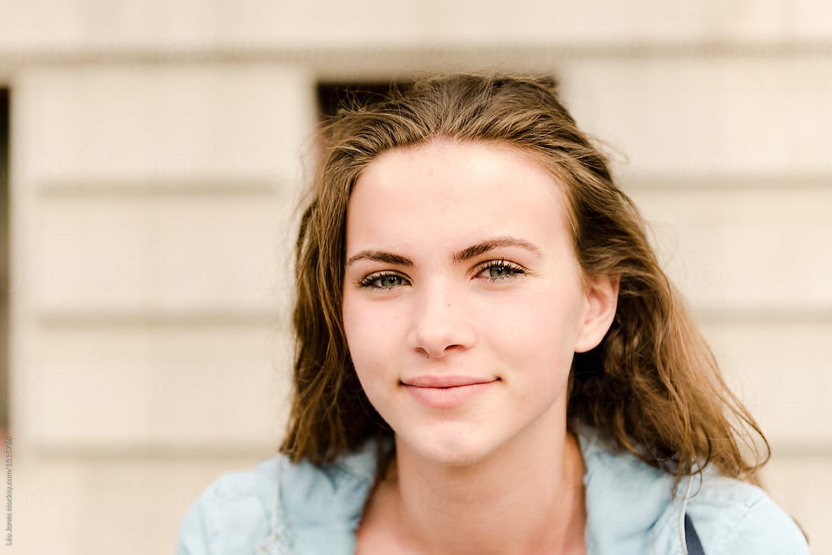 stock photo of portrait of young woman slightly smiling