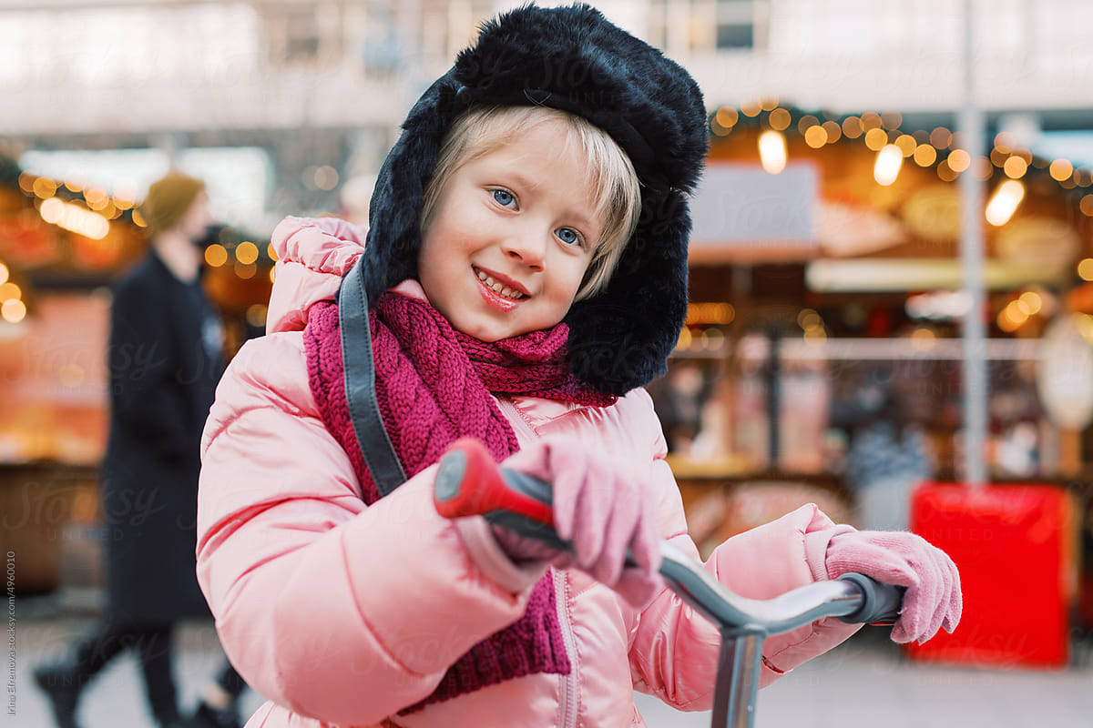 Festive Joy: Little Girl in Pink with Candy Cane