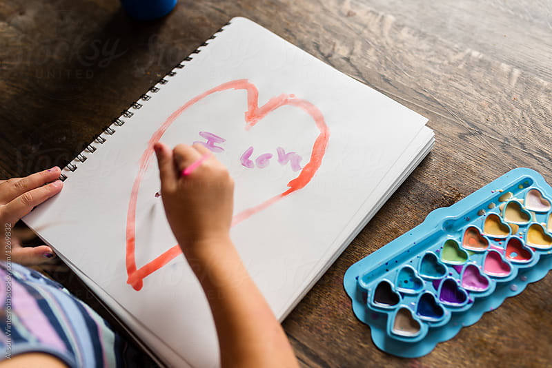 Girl Paints With Bright Colors A Heart