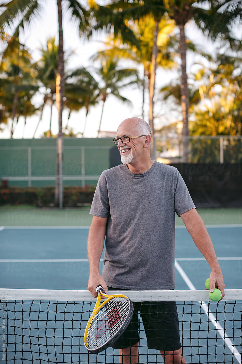 Middle age man playing tennis