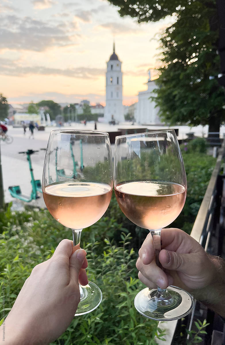 Anonymous Couple Hands Holding Glasses Of Wine Outdoors