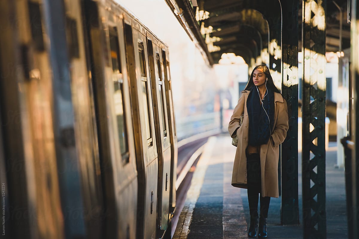 Woman waiting on subway platform