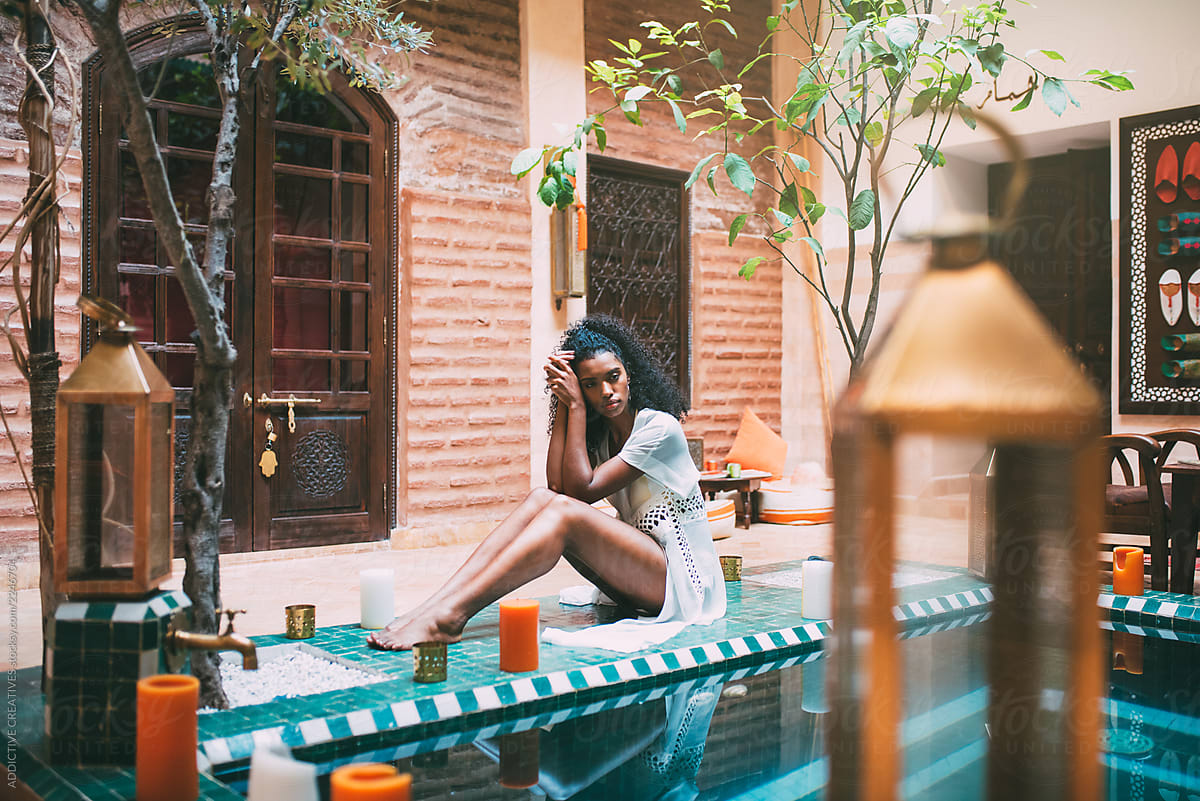 Woman Sitting In A Bikini At The Swimming Pool By Addictive Creatives Black Marrakech