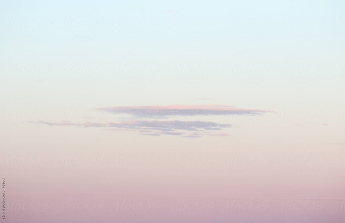 Flat cloud in pastel summer evening sky