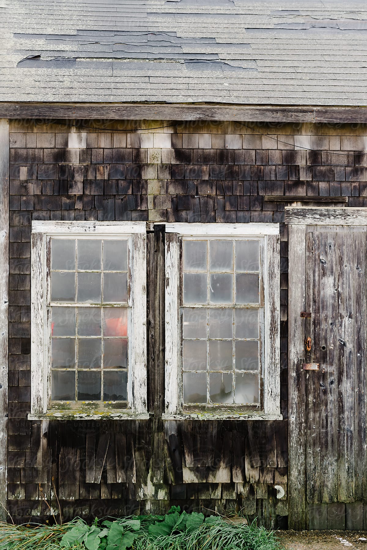 old windows on a fishing hut