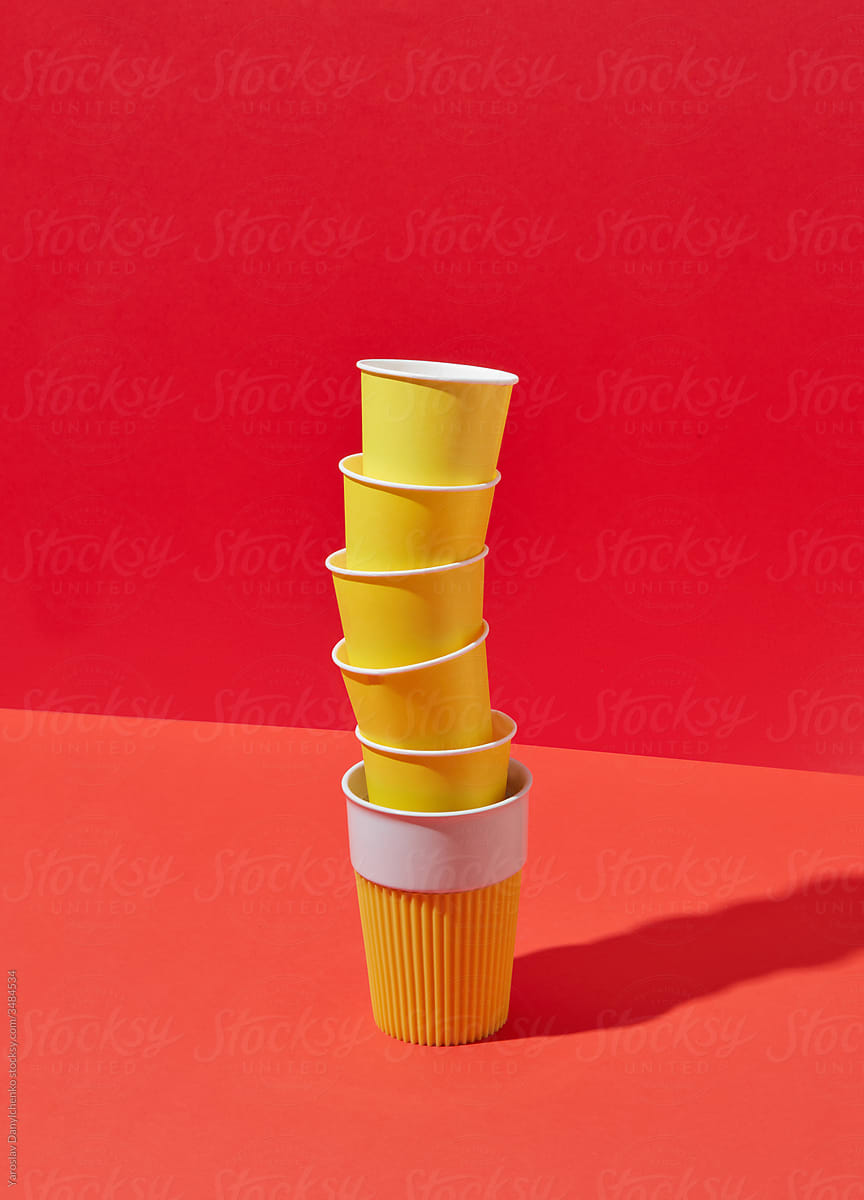 Vertical stack from one ceramic and many paper cups.