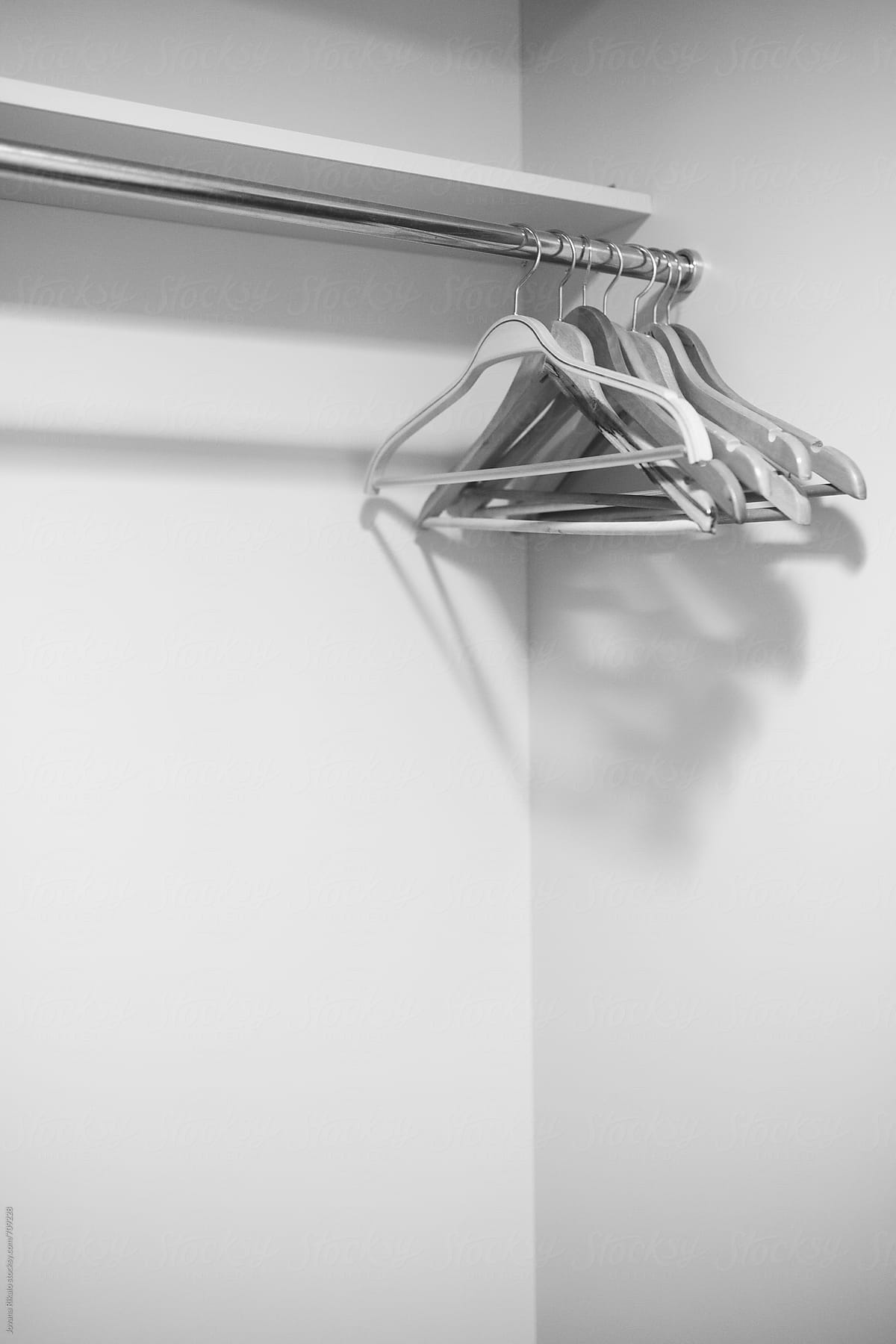 Coat hangers on a metal rack