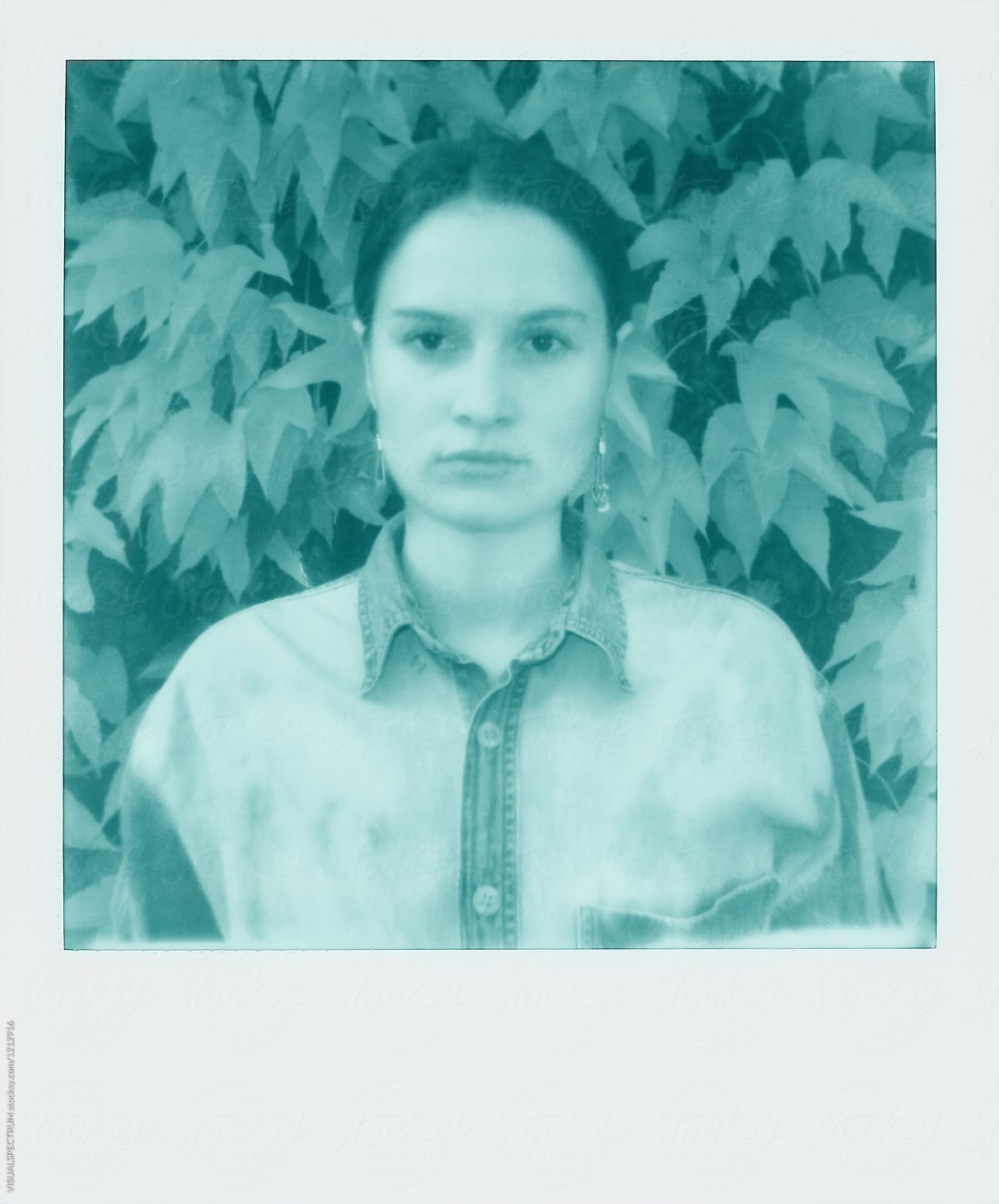 Monochrome Polaroid Of Young Woman In Front Of Ivy By Visualspectrum
