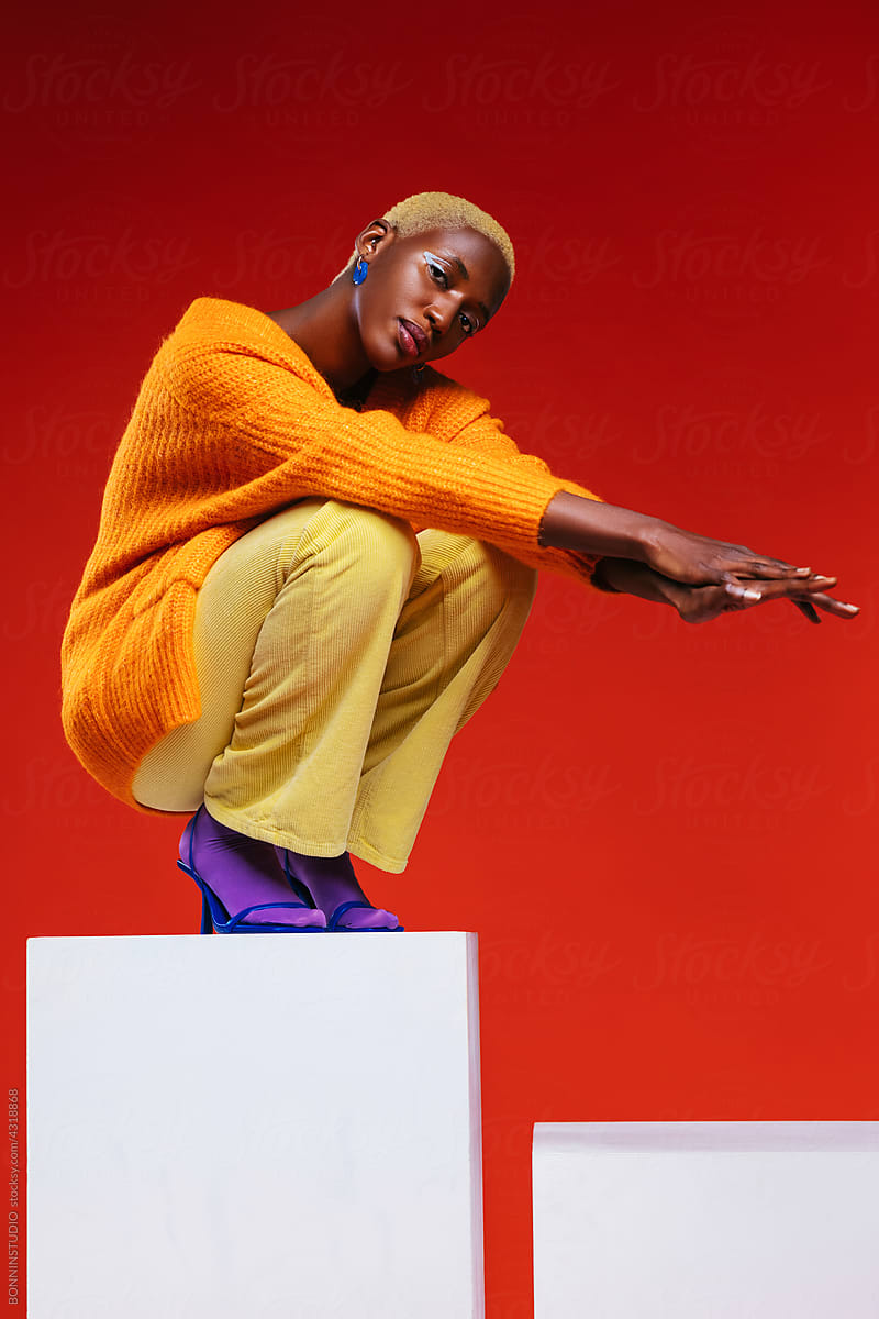 Woman in colorful clothes in studio