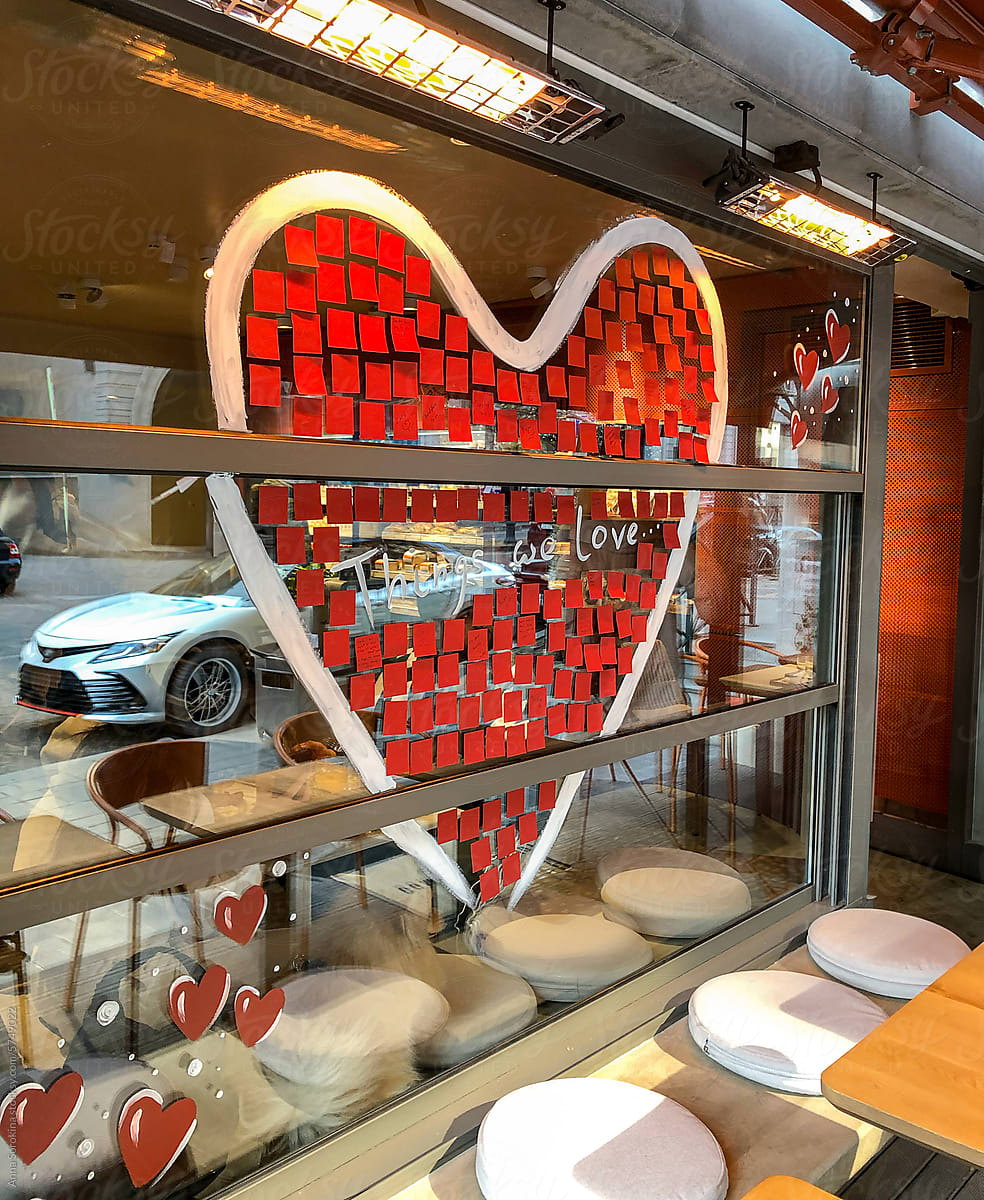 Heart made of stickers on the cafe\'s facade