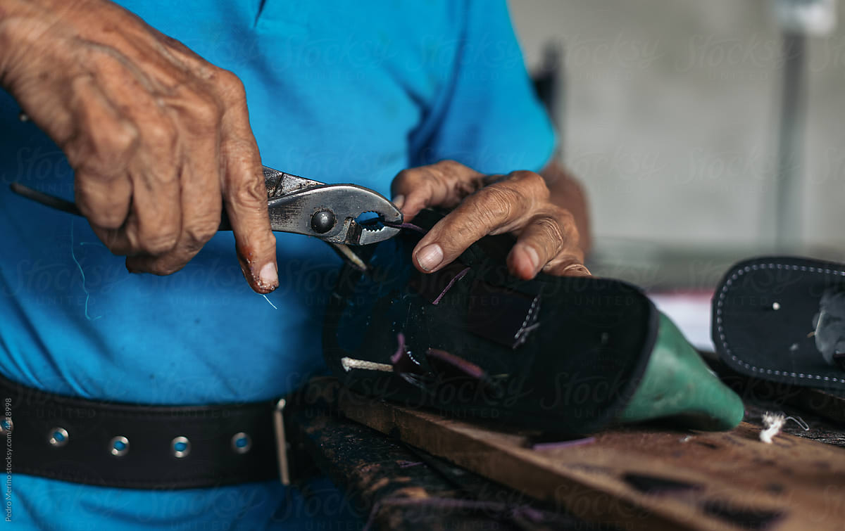 Anonymous shoemaker working