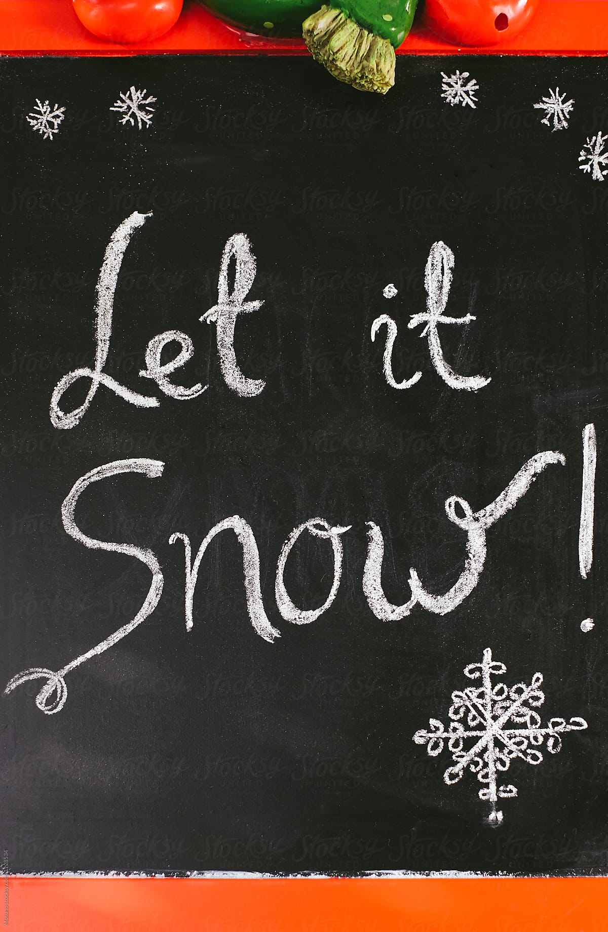 Let It Snow Written on a Black Board