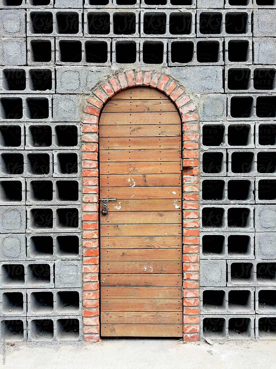 Brick arch for wooden doorway in cinder block wall