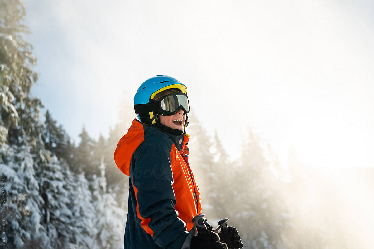 portrait of young happy skier