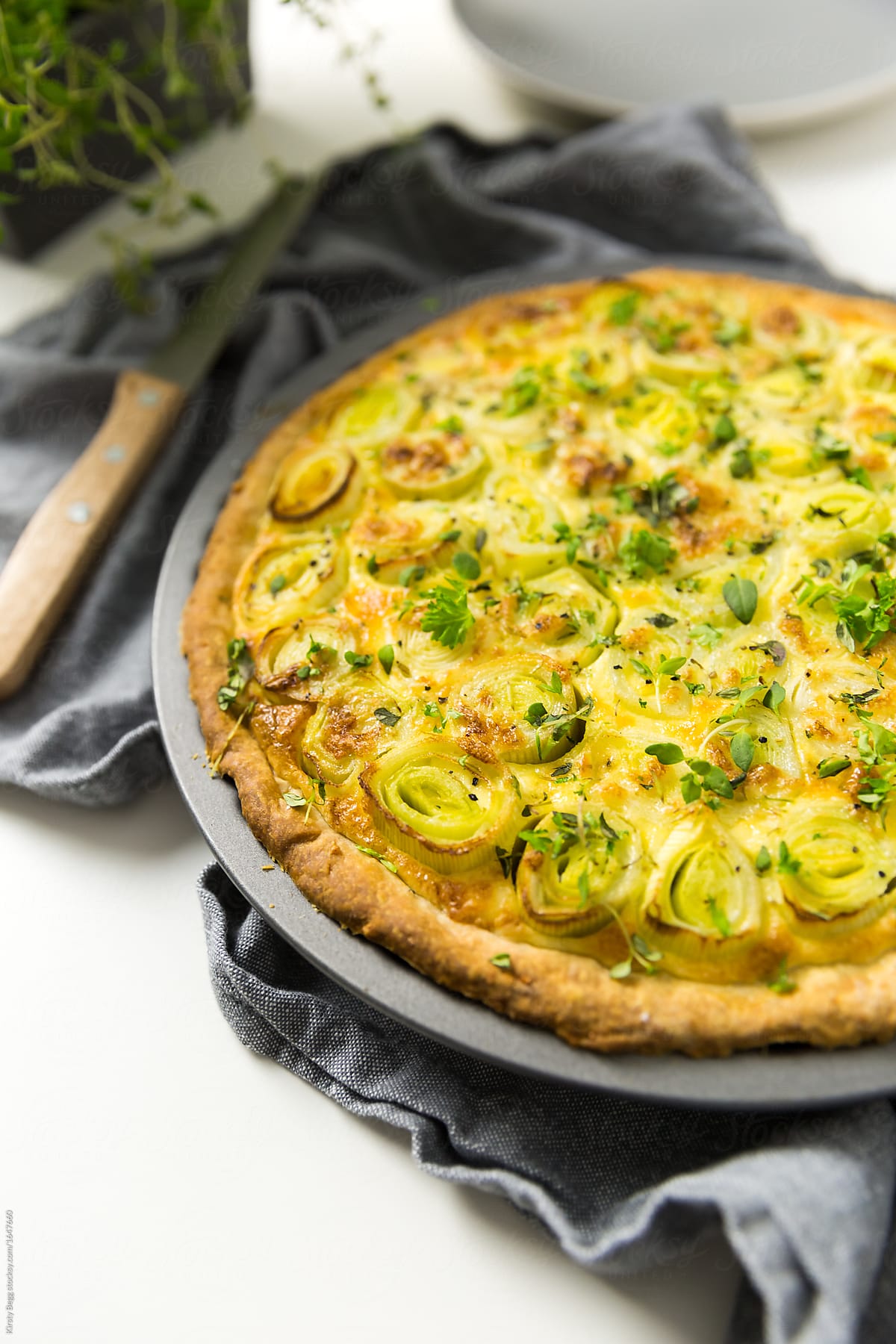 CHeese and leek tart on table