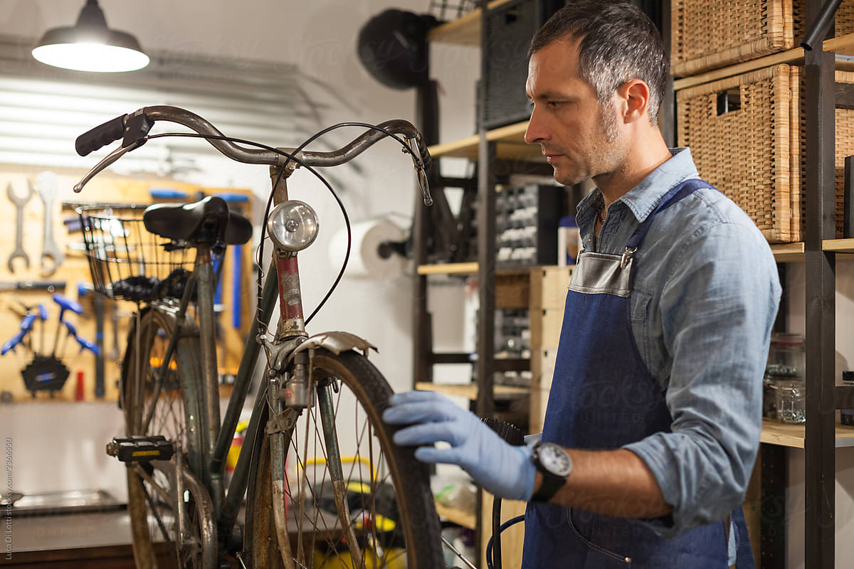 Artisan inside a bike rapairing shop