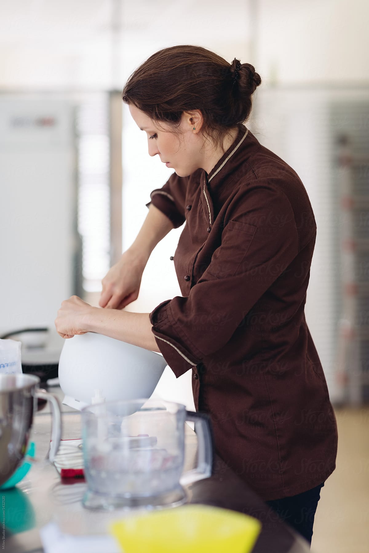 Woman mixing ingredients in bowl