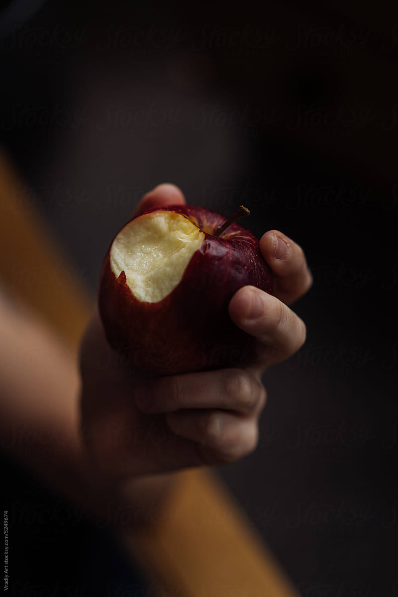 An apple in the hands