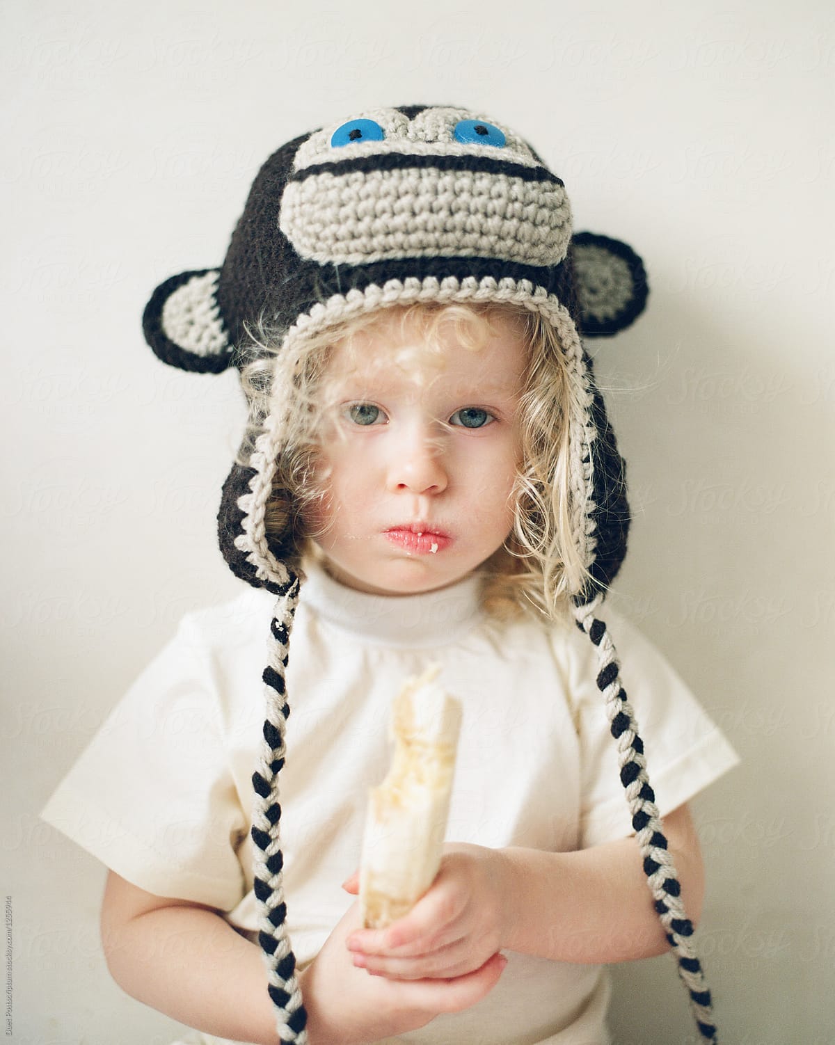 «Cute Baby Wearing Funny Hat» del colaborador de Stocksy «Duet ...