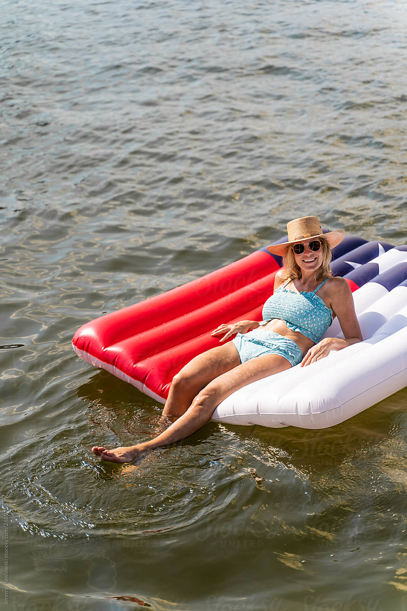 Blonde Female On Texas Flag Float