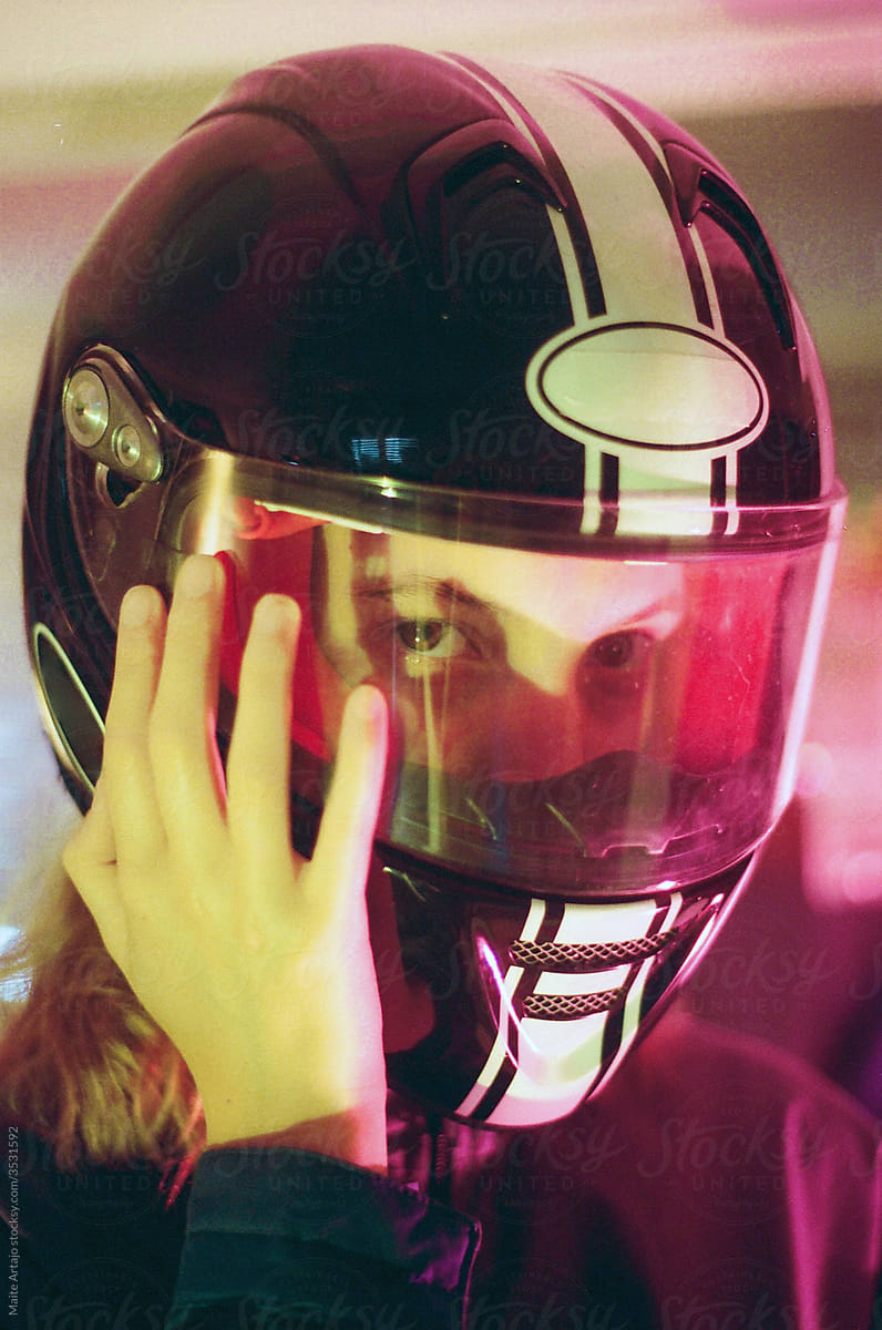 Girl touching her helmet
