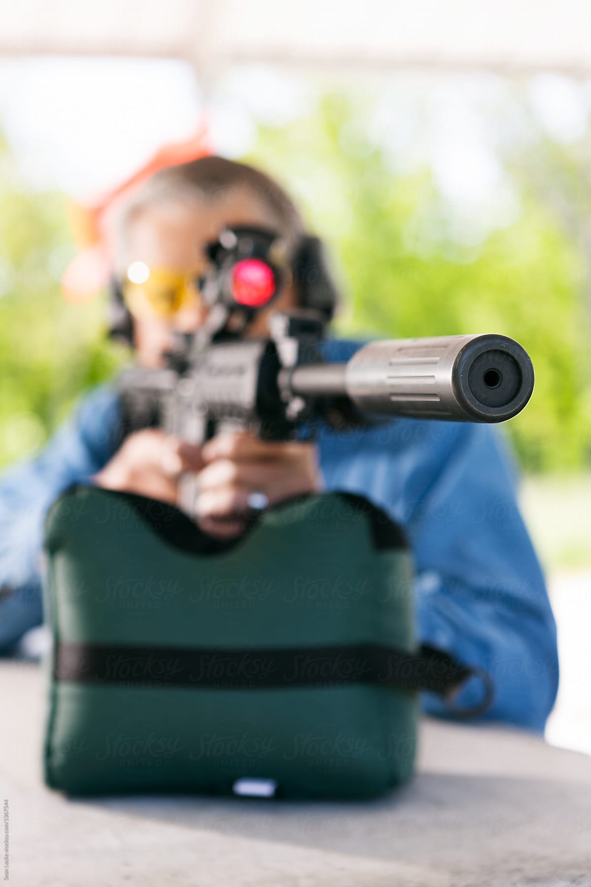 Shooting: Focus On Supressor On AR-15 Semi-Automatic Rifle