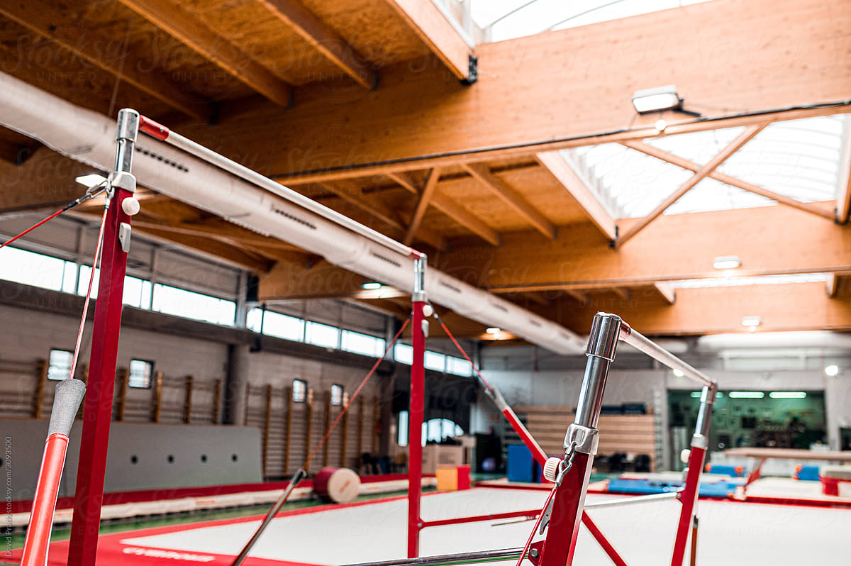 uneven bars for exercise parallels in a modern Gym for artistic gymnastic