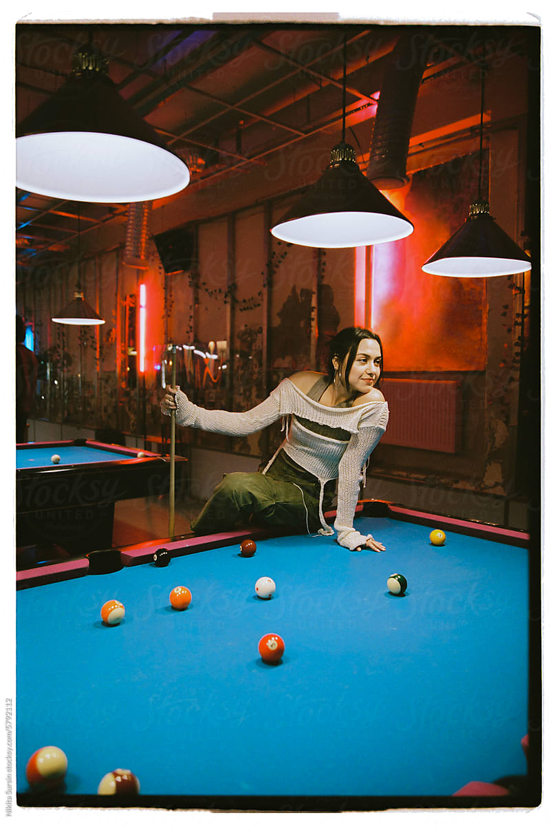 woman playing pool table snooker game