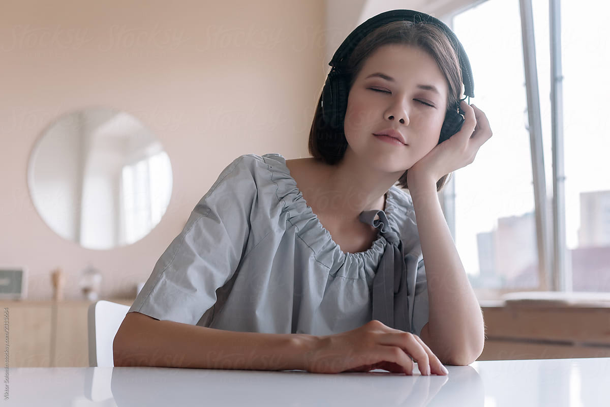 Beautiful Closeup Portrait Of Cute Asian School Girl Listening Music 