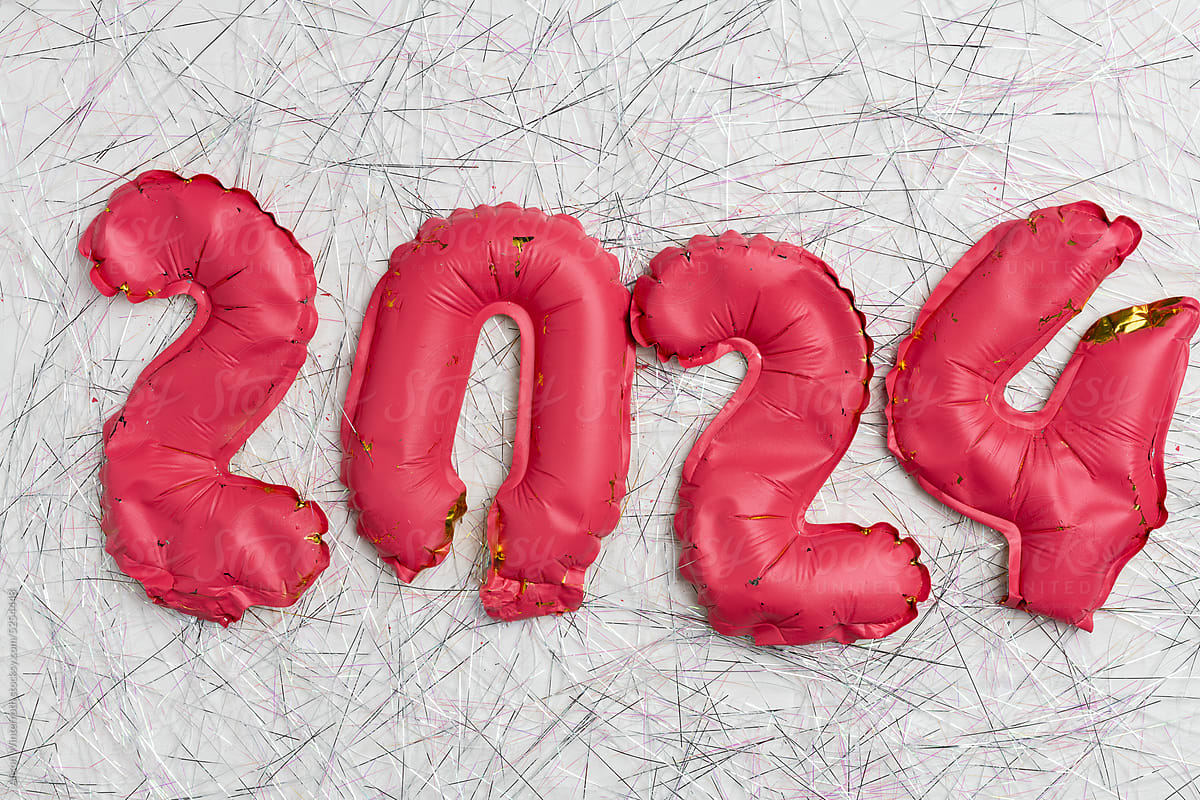 End of 2024 concept deflated balloons