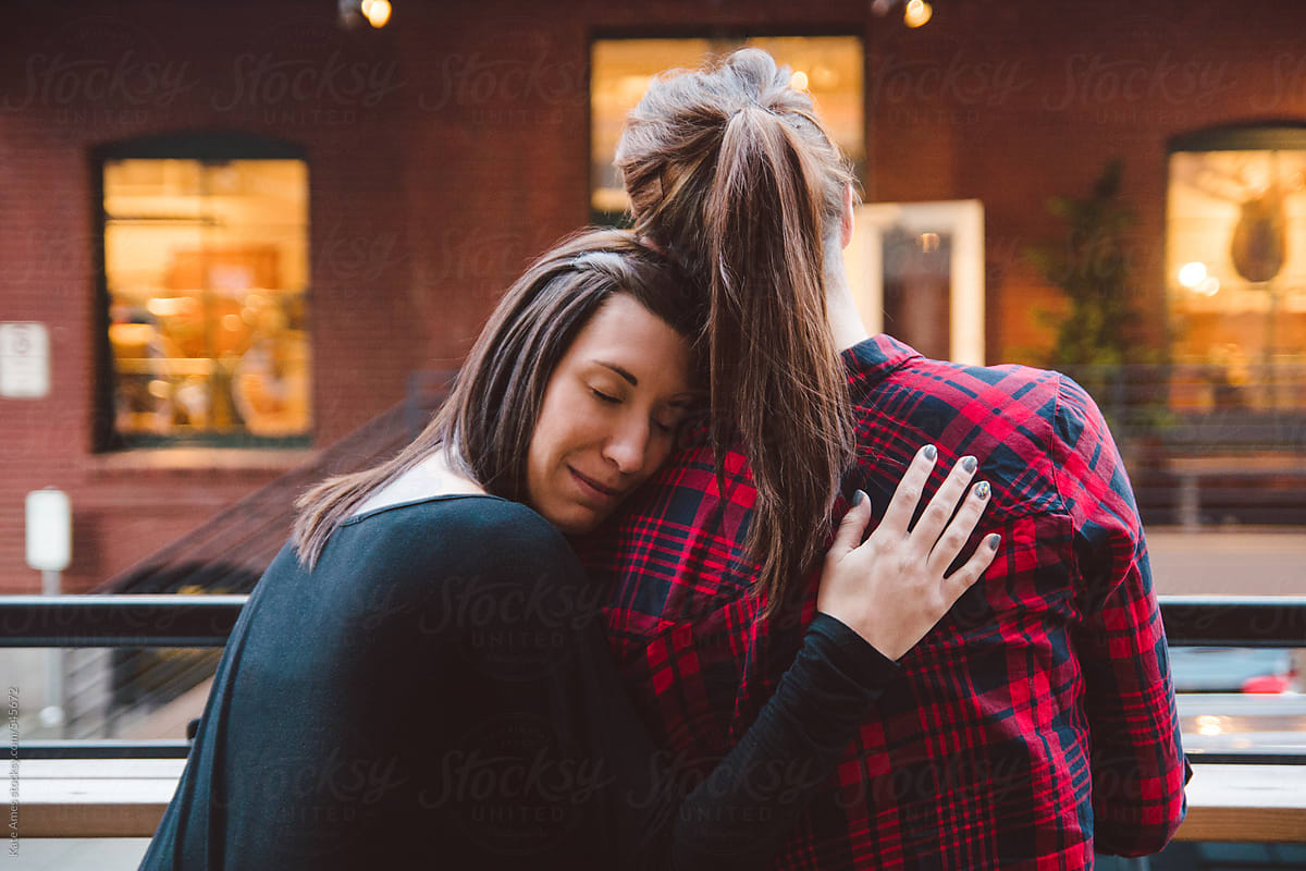 Lesbian Couple On A Date Night Downtown By Stocksy Contributor Kate