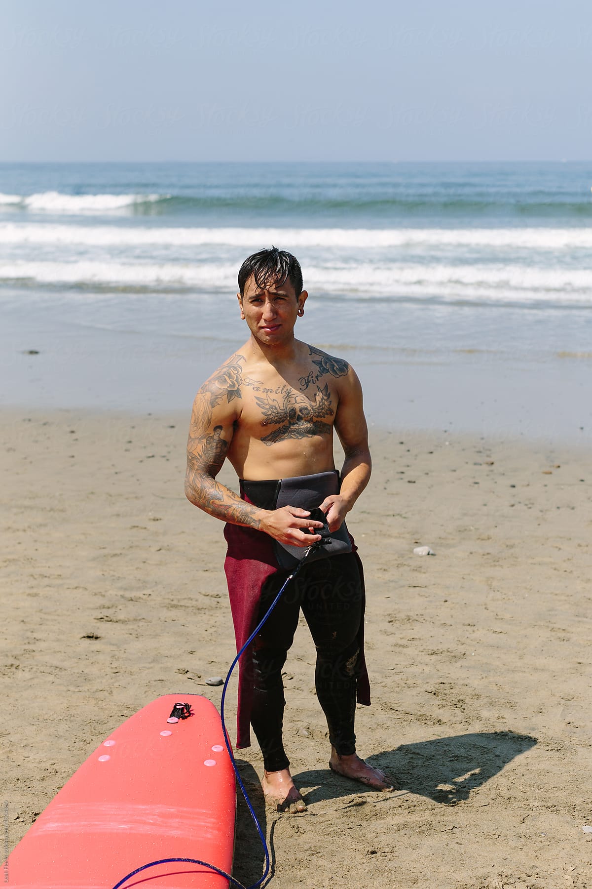 Tattooed surfer