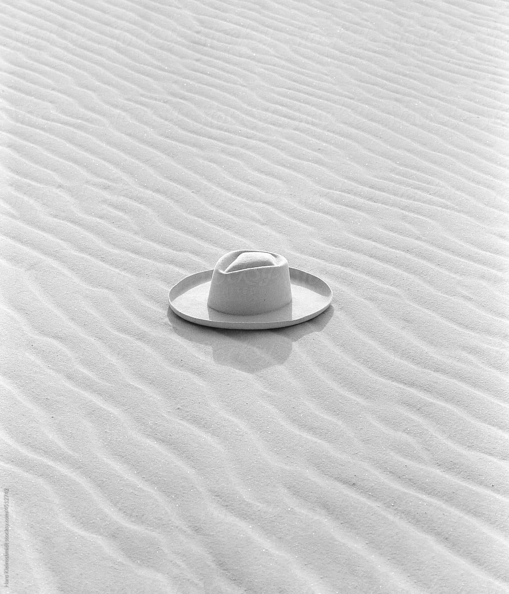Cowboy hat in the sand