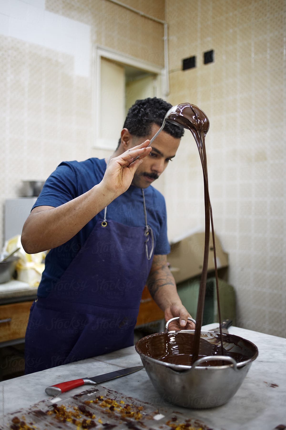 Artisan chocolate maker at work