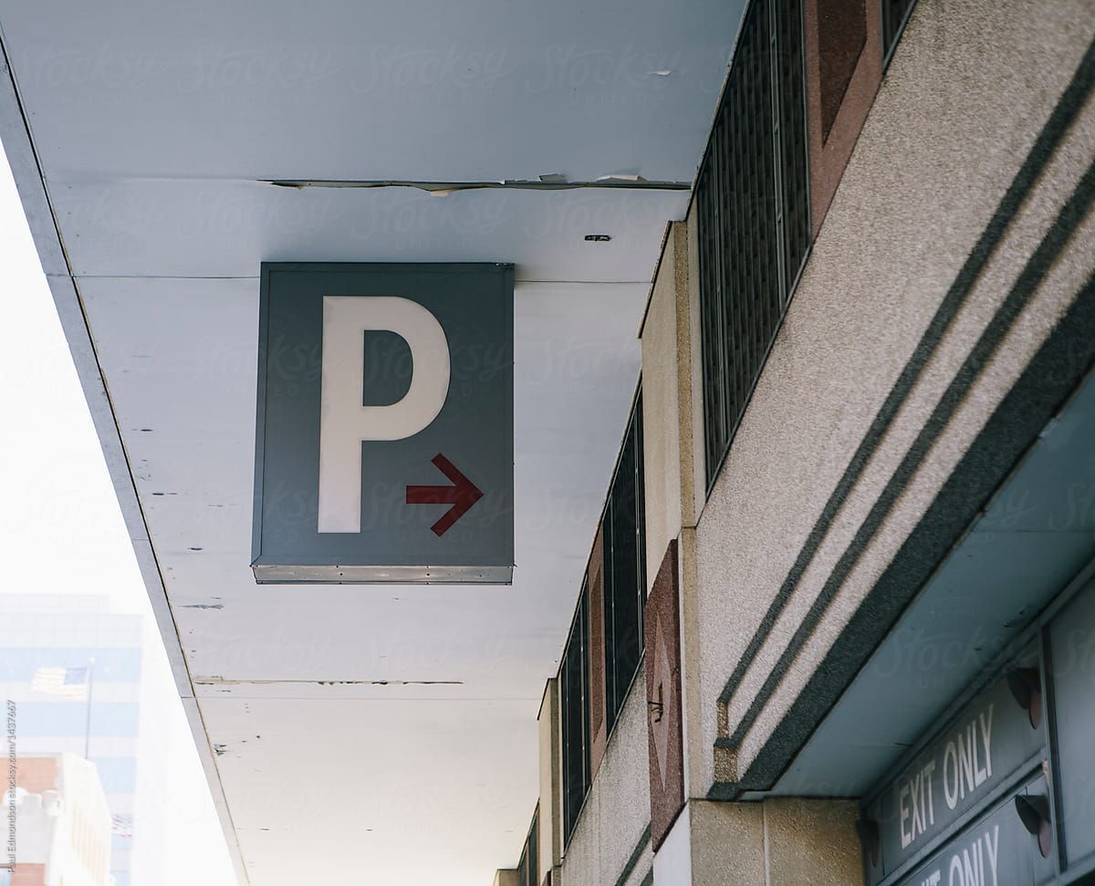 Parking sign outside garage