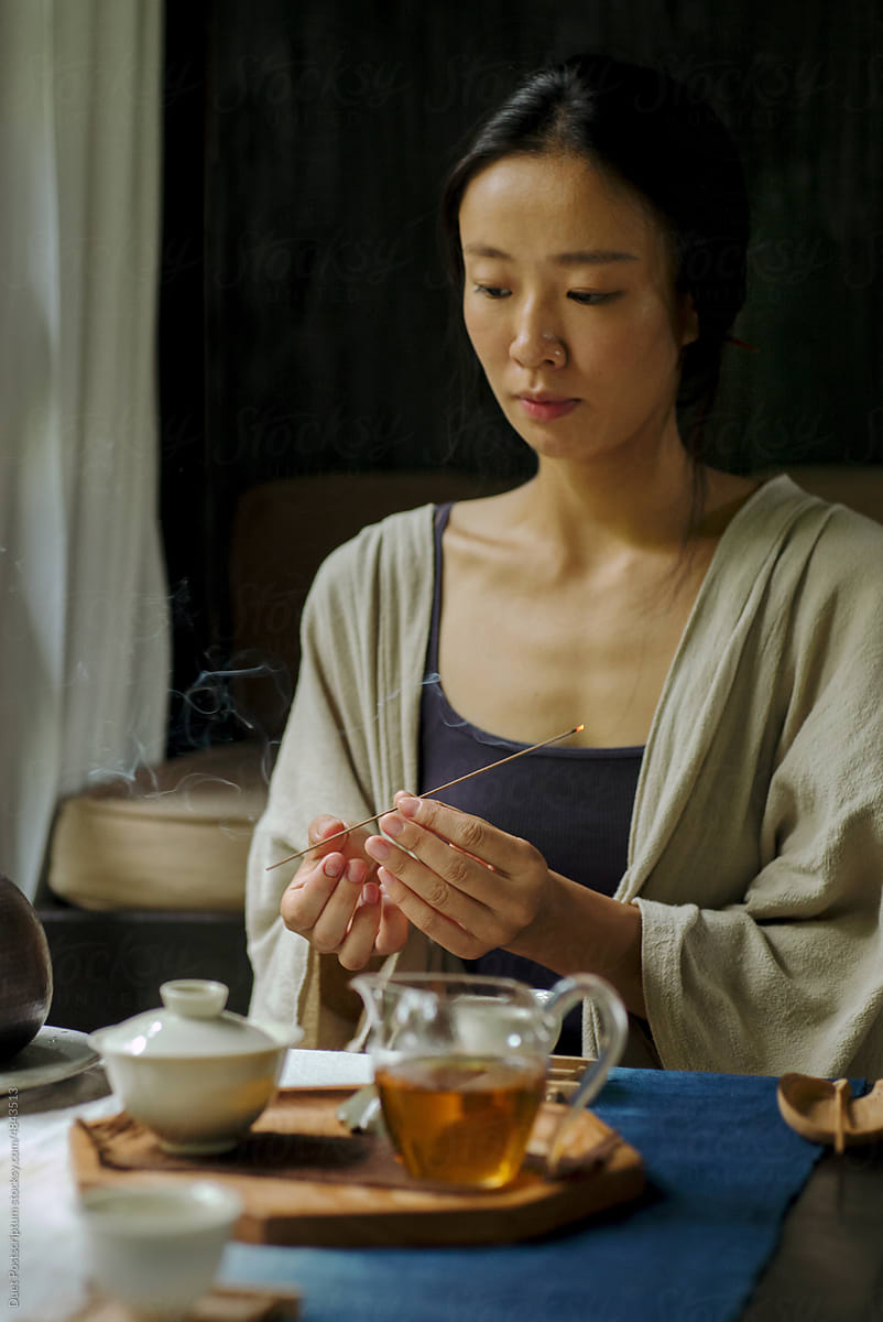 Portrait of a young asian female tea master
