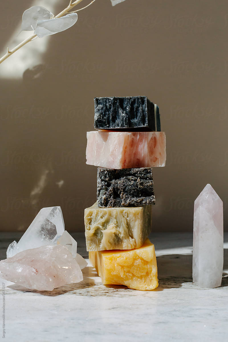 Stack of colorful handmade soap on table