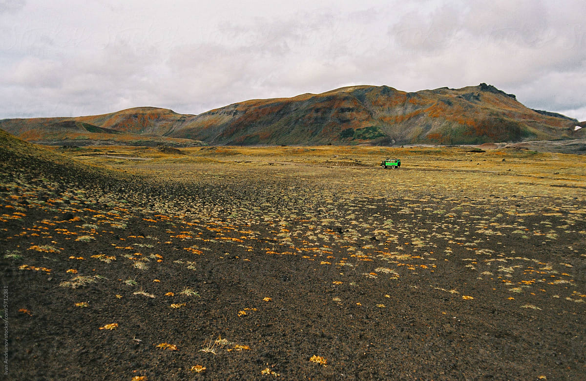Wild Colored Mountain Landscape With Authentic Car