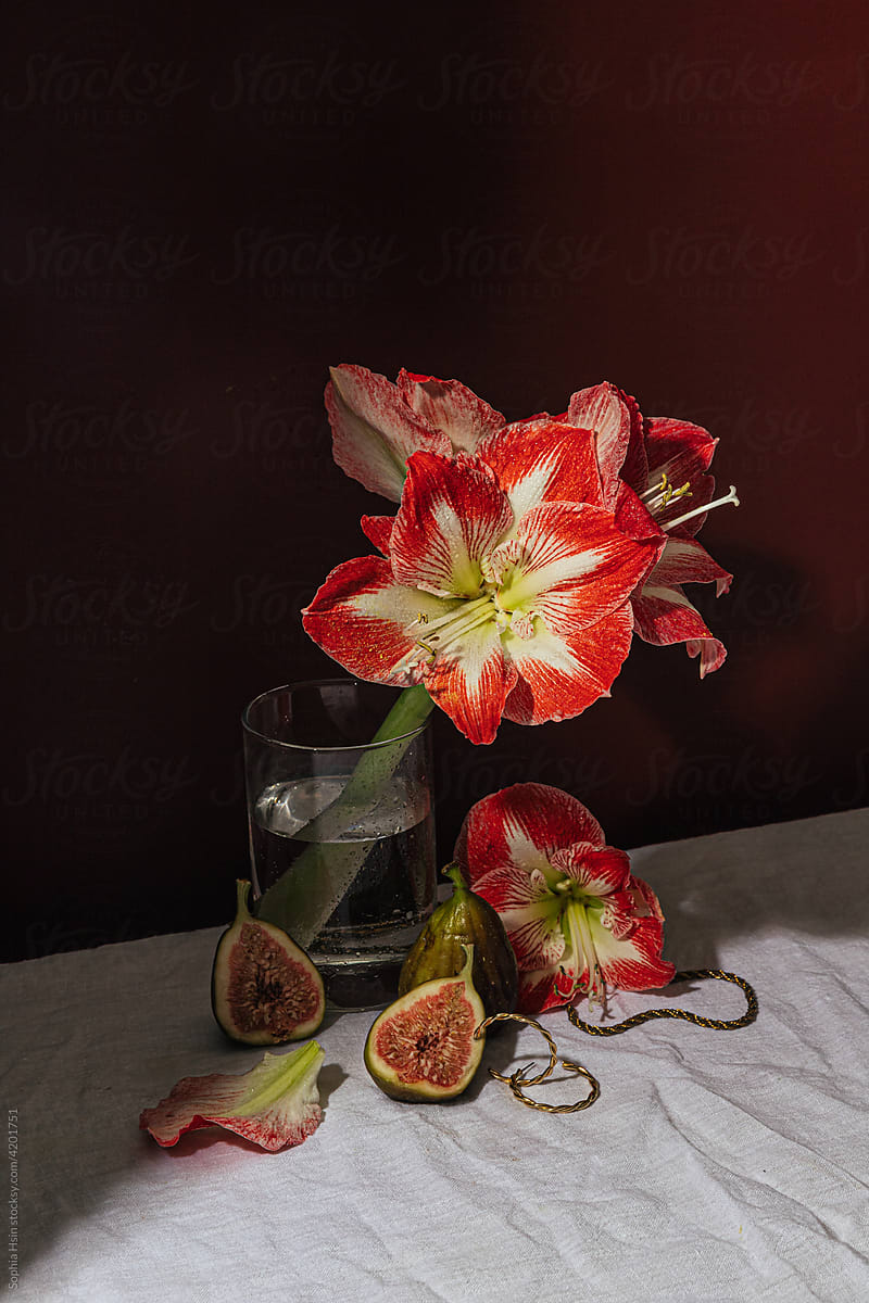 Amaryllis, fig, and gold earrings