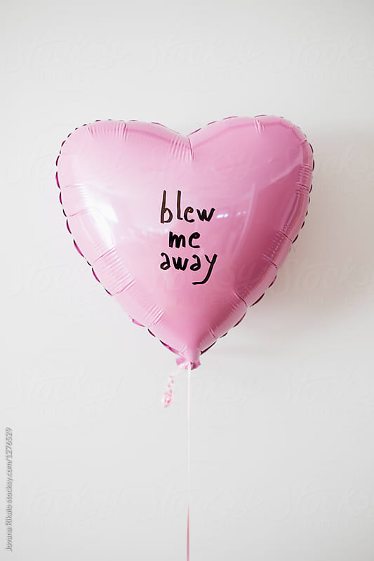 Heart-shaped balloon with a message \