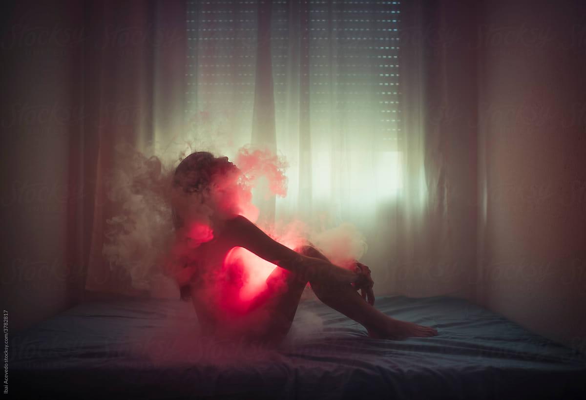 Dreamy portrait of a burning woman
