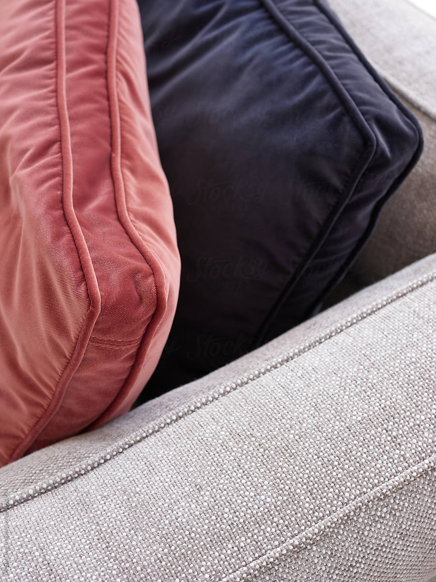 Velvet cushions on sofa