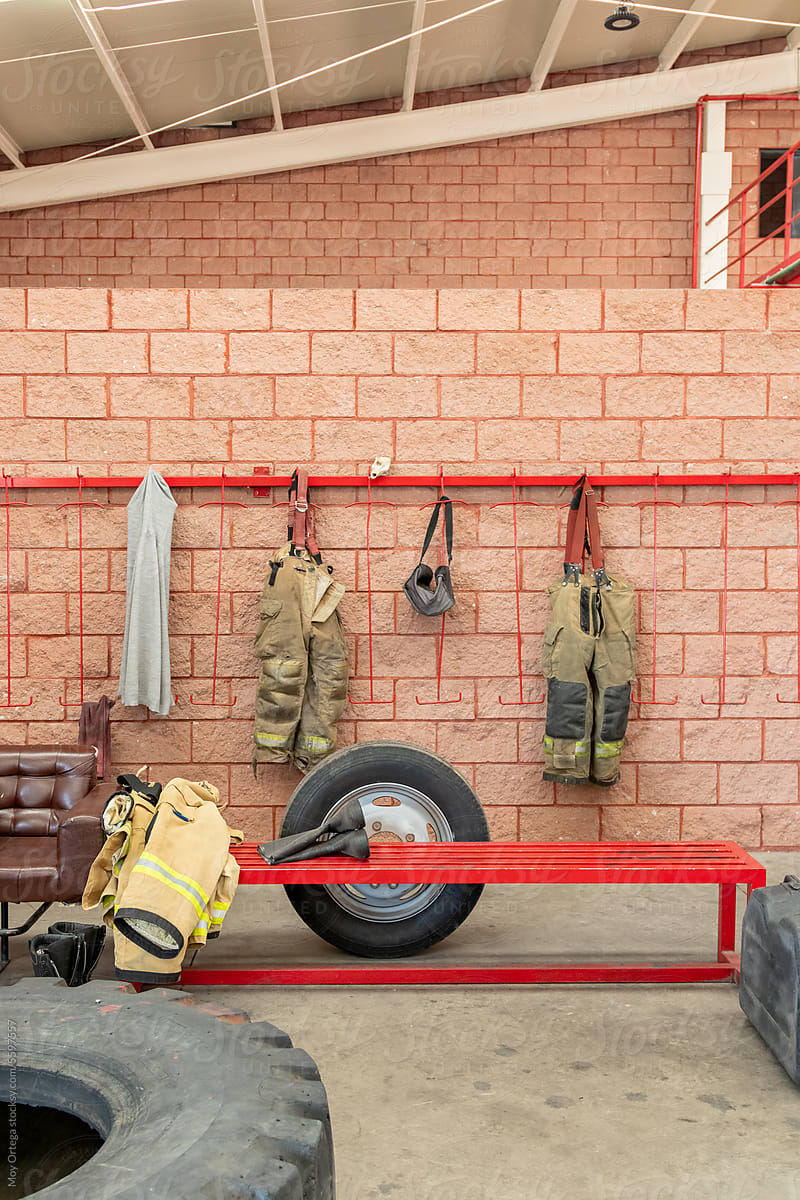 Fire Station Personnel Uniforms Hung On Clothespins