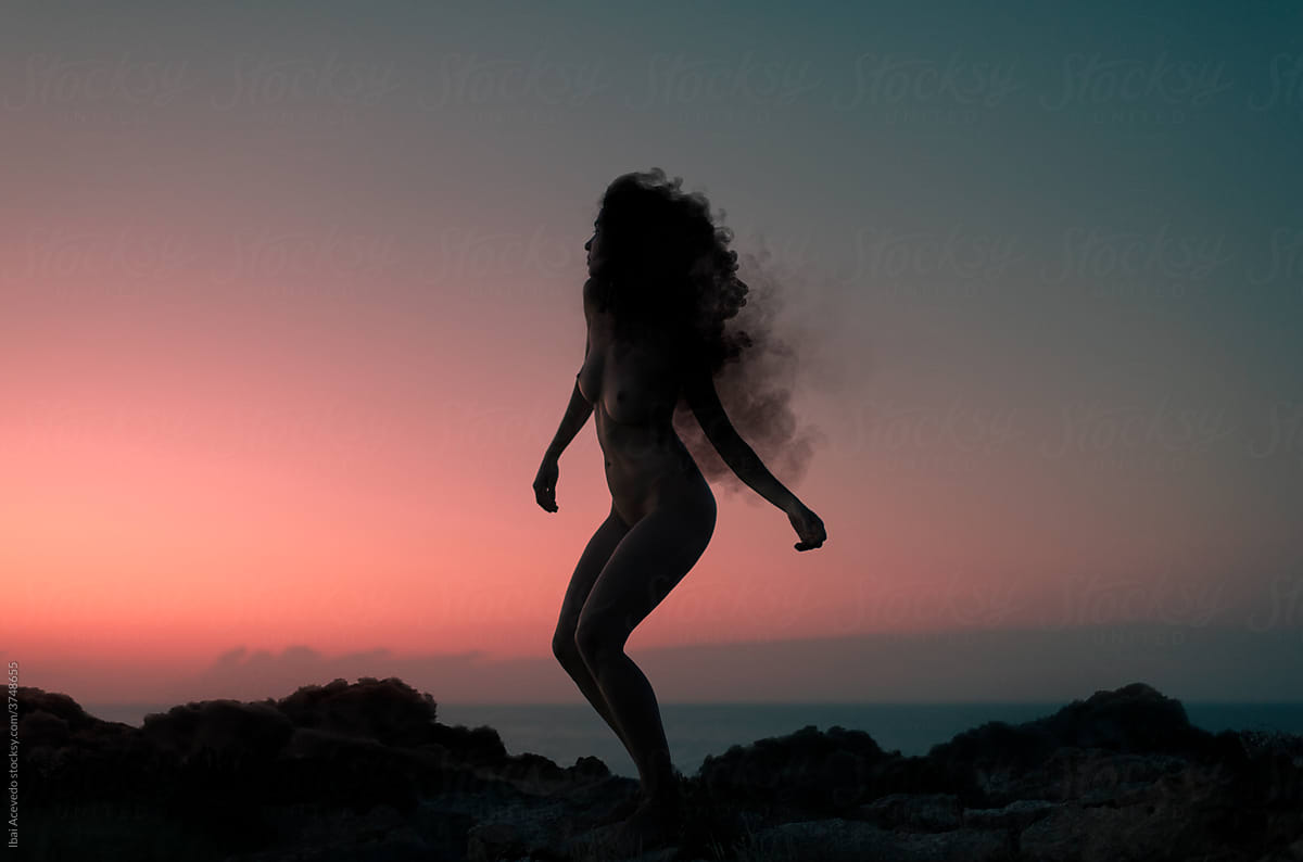 Dancing woman with burning head