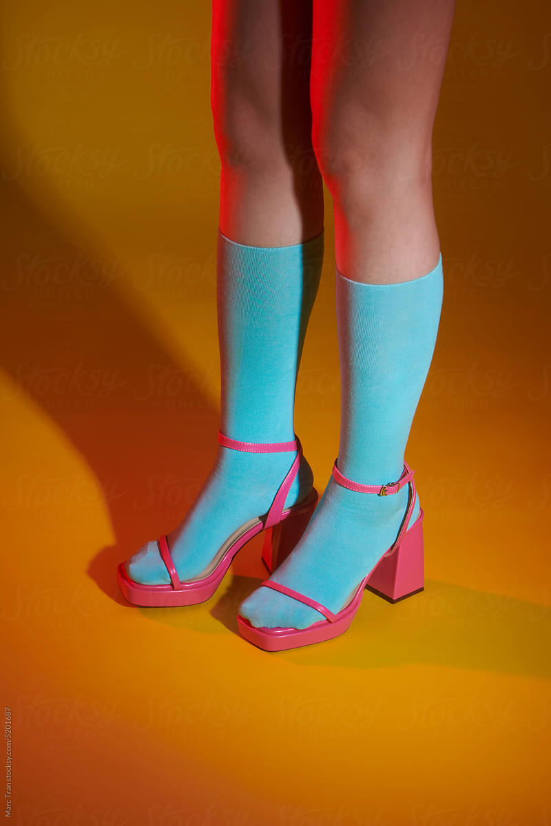 Cropped shot of woman wears  fashionable pink high heeled