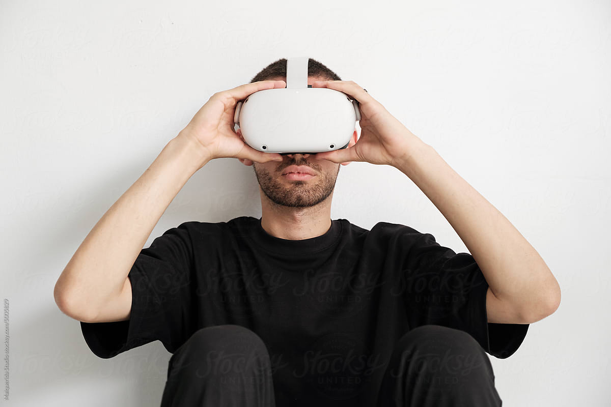 Young man wearing VR goggles