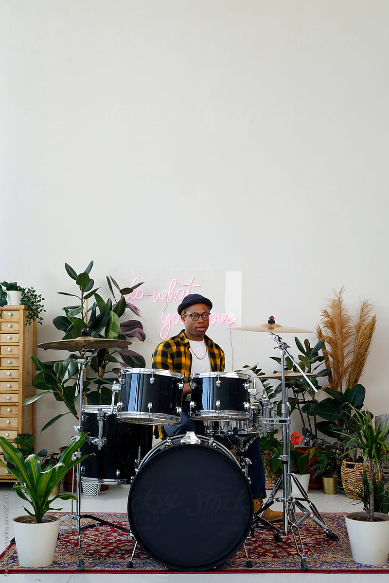 Black man with drums in studio