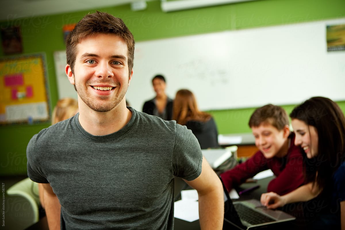 High School: Teen Male Happy to Be in Class